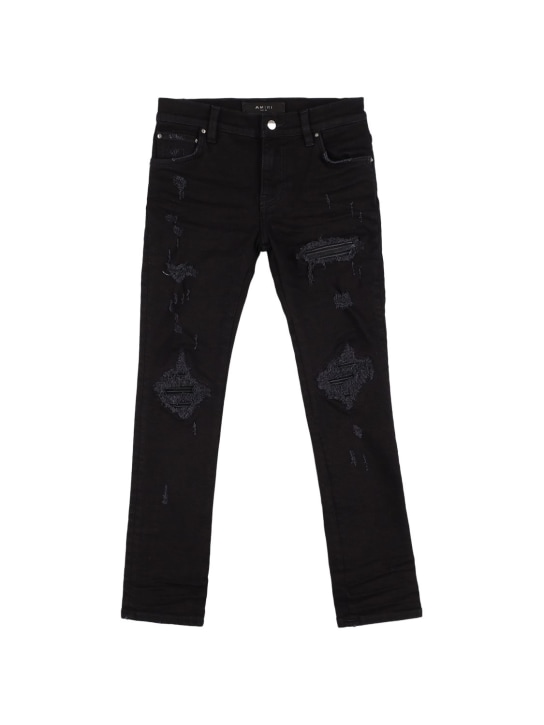 Amiri - Distressed stretch cotton denim jeans