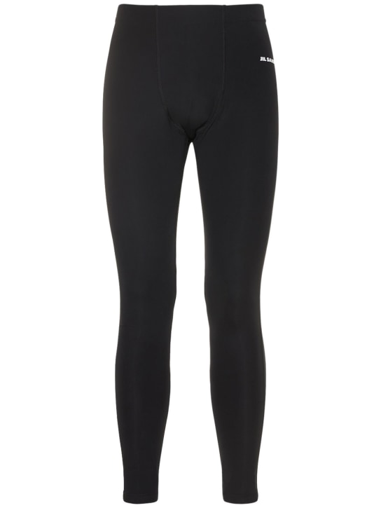 Jil Sander: LEGGINGS AUS TECHNOSTOFF MIT LOGODRUCK
