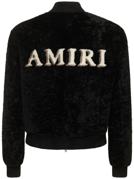 Amiri: Bomber in shearling con zip