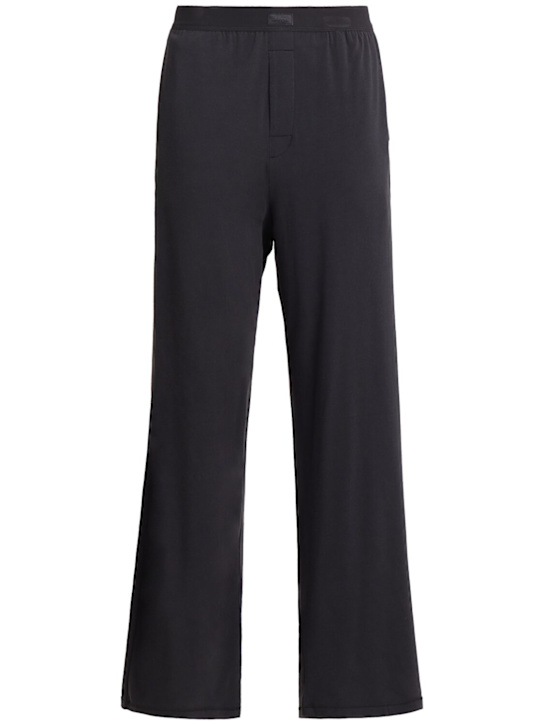 SKIMS - Pantalon boyfriend loose en mélange de coton