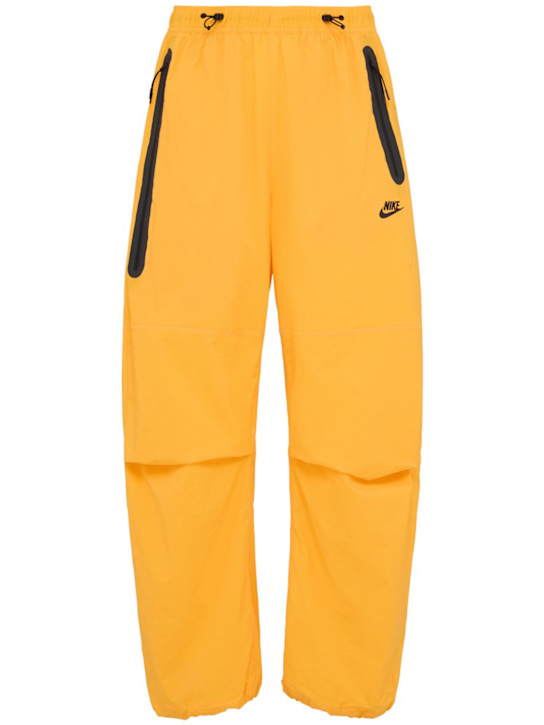 Nike: Pantaloni in techno