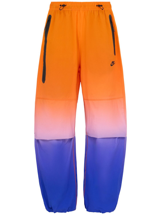 Nike: Pantaloni in techno