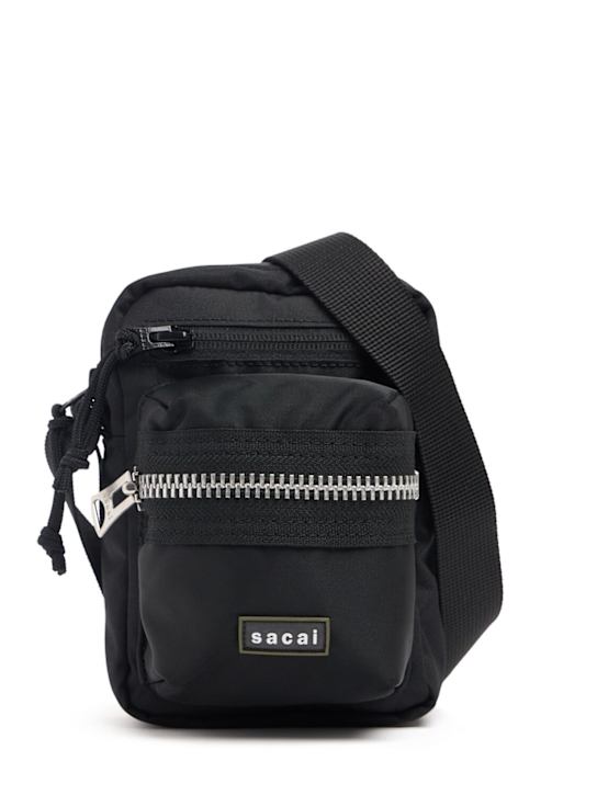 Sacai: Pocket pouch crossbody bag