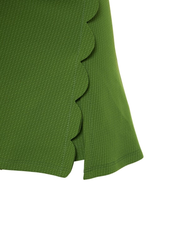 Marysia: Jupe-short en tissu technique stretch Steffi