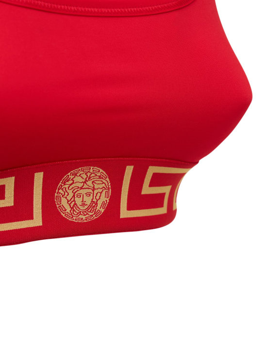 Versace: Brassière en tissu technique stretch à logo Greca