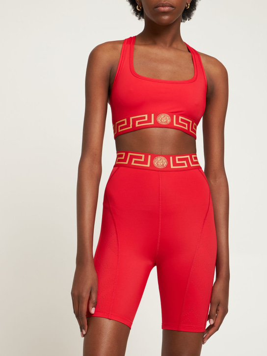 Versace: Brassière en tissu technique stretch à logo Greca