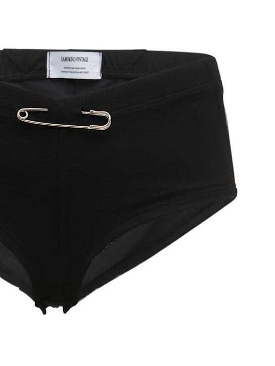 Sami Miro Vintage: Shorty à coutures ouvertes