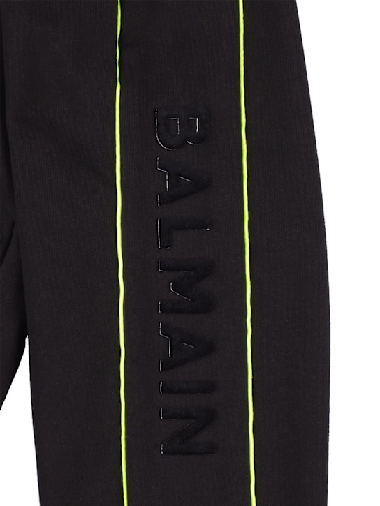 Balmain: Cotton sweatpants w/ logo side bands