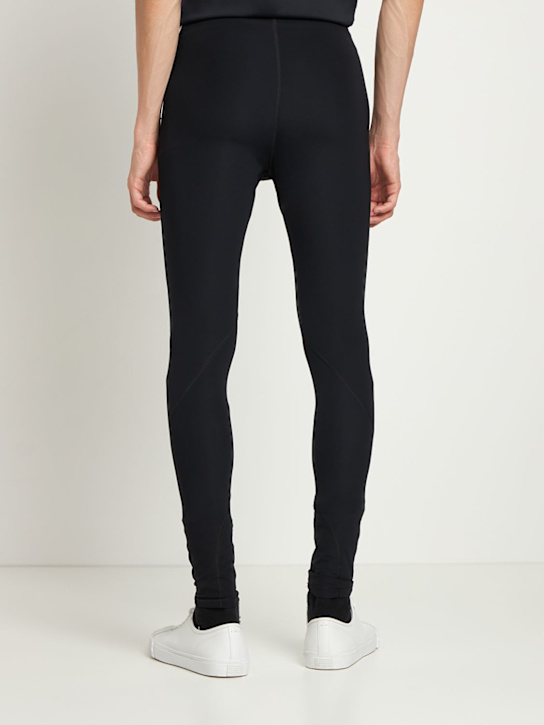 Jil Sander: LEGGINGS AUS TECHNOSTOFF MIT LOGODRUCK