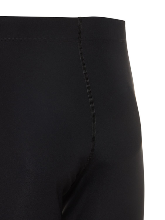 Jil Sander: LEGGINGS AUS TECHNOSTOFF MIT LOGODRUCK