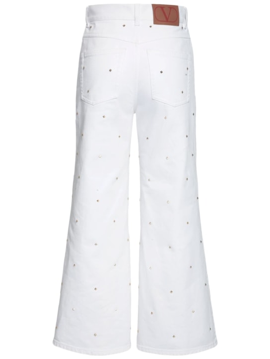 Valentino: Rockstud high rise denim wide jeans