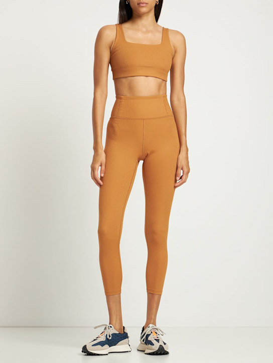 Girlfriend Collective: Leggings vita alta in techno a costine