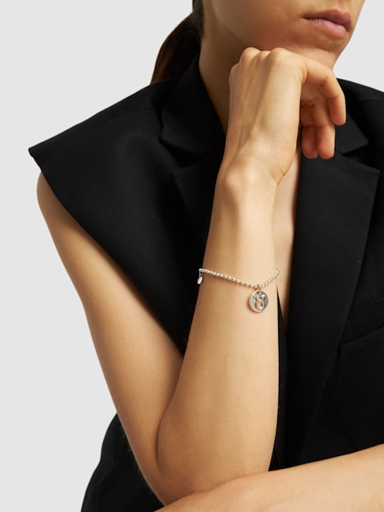 DoDo: 9kt Rose gold & silver Taurus charm