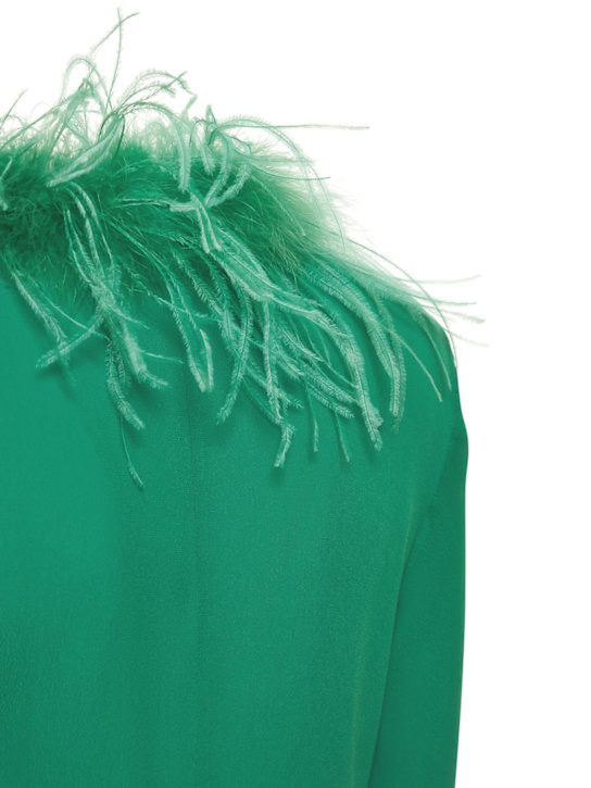 Giuseppe Di Morabito: Top de viscosa con plumas