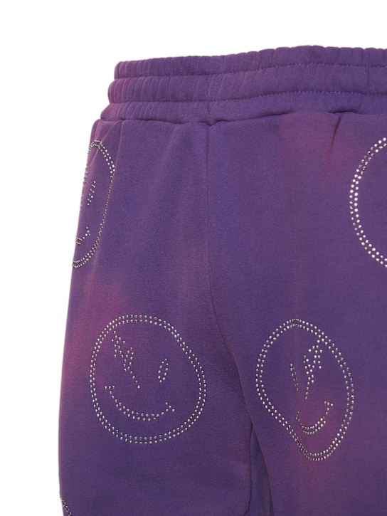 Retrovert: All over rhinestone smiley sweatpants