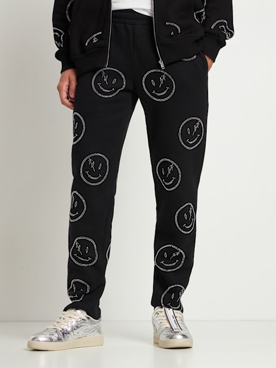 Retrovert: Trainingshose mit Strass-Smileys