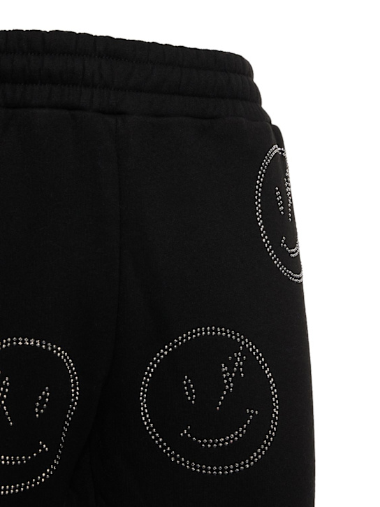 Retrovert: Trainingshose mit Strass-Smileys