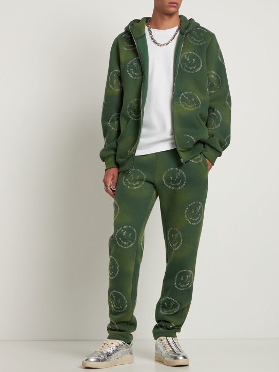 Retrovert: All over rhinestone smiley sweatpants