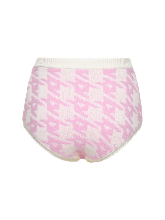 Area: Shorts de lana