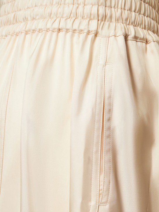 Jil Sander: Pantalon ultra-large fluide délavé