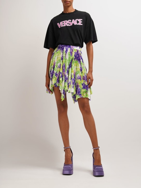 Versace - Jupe courte plissée en crêpe imprimé orchidée