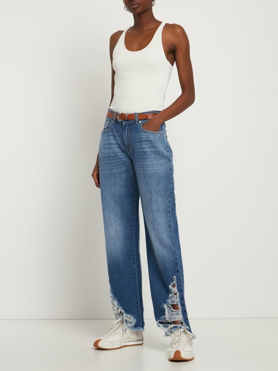Stella McCartney - Jeans vita bassa in denim di cotone distressed