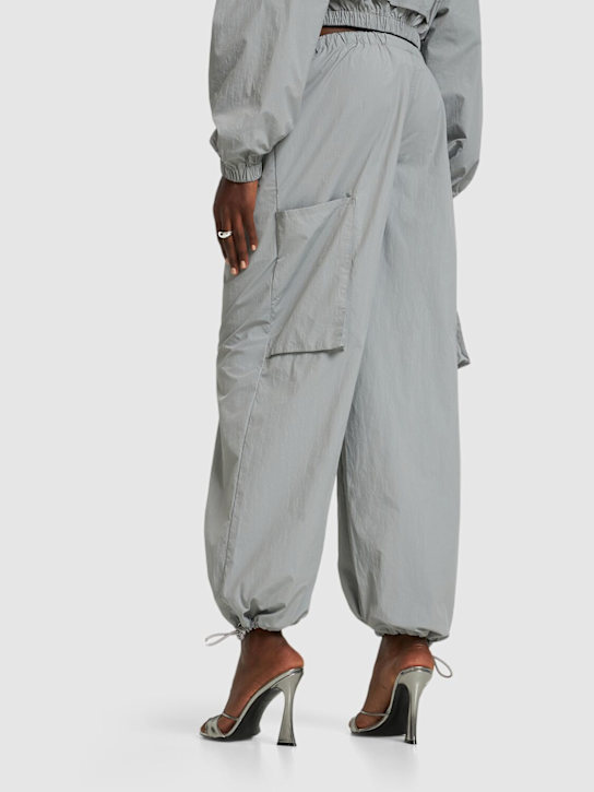Saks Potts: Pantaloni loose fit Esther in nylon
