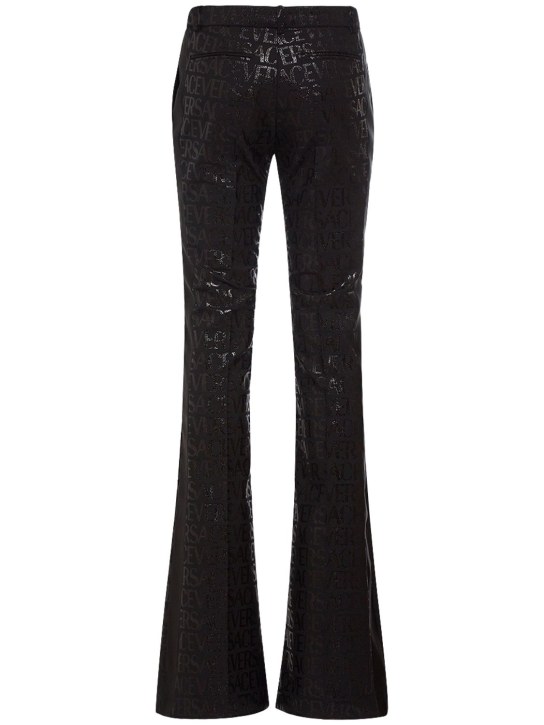 Versace: Pantalon évasé en jacquard à logo
