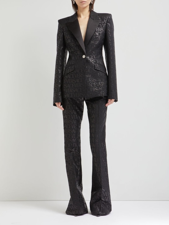 Versace - Pantalon évasé en jacquard à logo