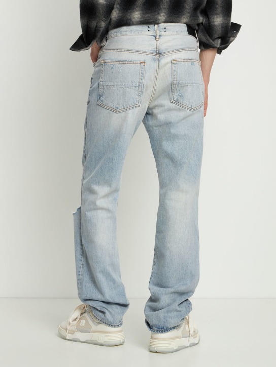 Amiri: Flare jeans with ripped details