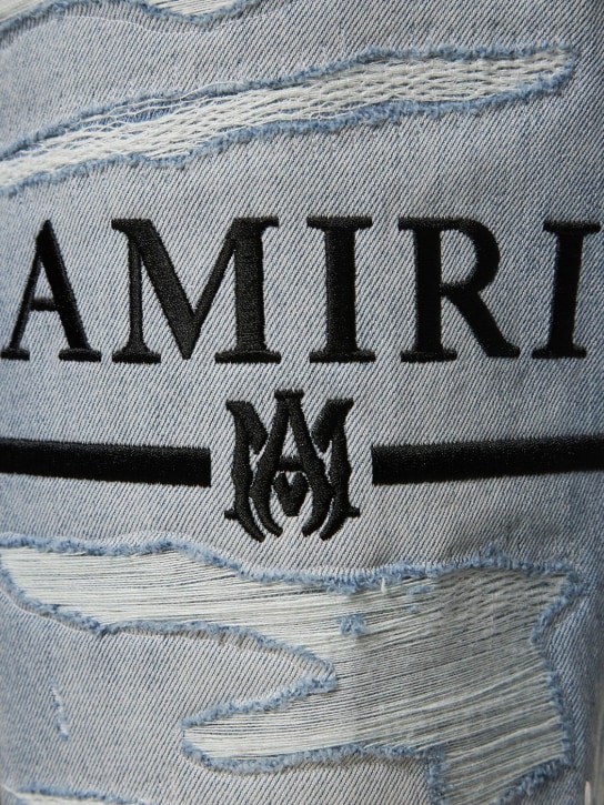 Amiri: Flare jeans with ripped details