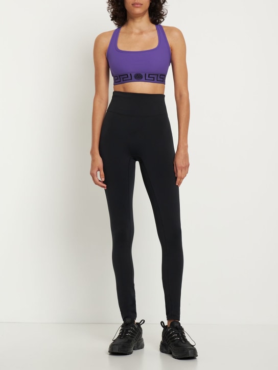 Versace: Brassière de sport tissu technique stretch Greca