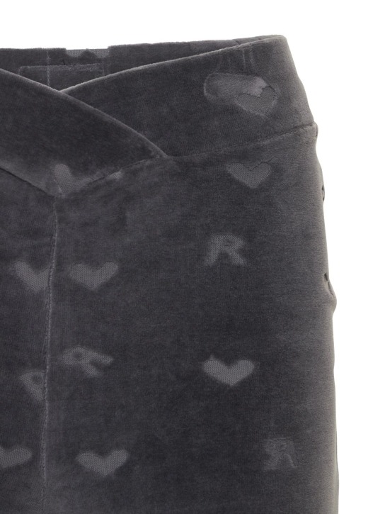 Rotate: Leggings de terciopelo con logo