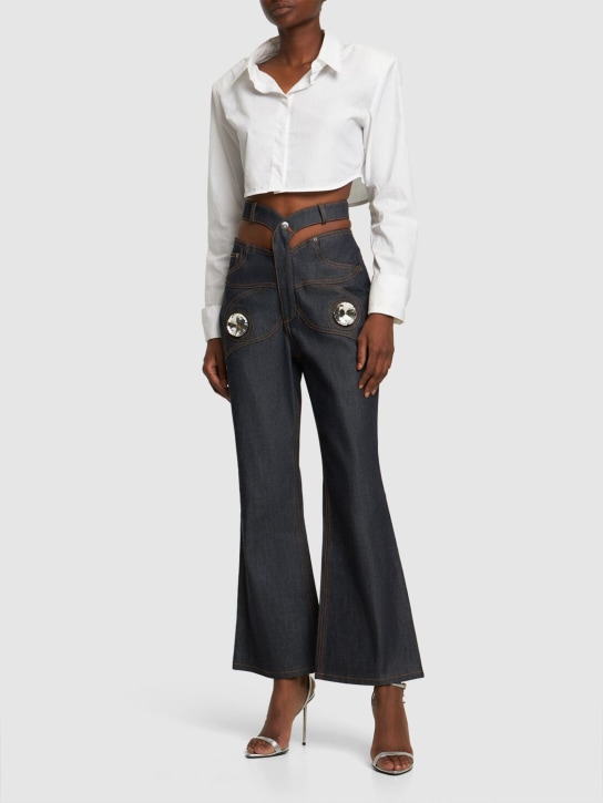 Area: Jeans Butterfly de denim de algodón