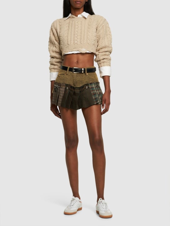 R13: Maglia cropped a trecce distressed