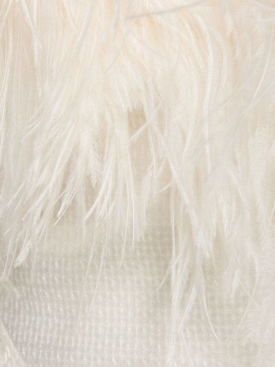 David Koma: Haut en sequins et plumes avec manches