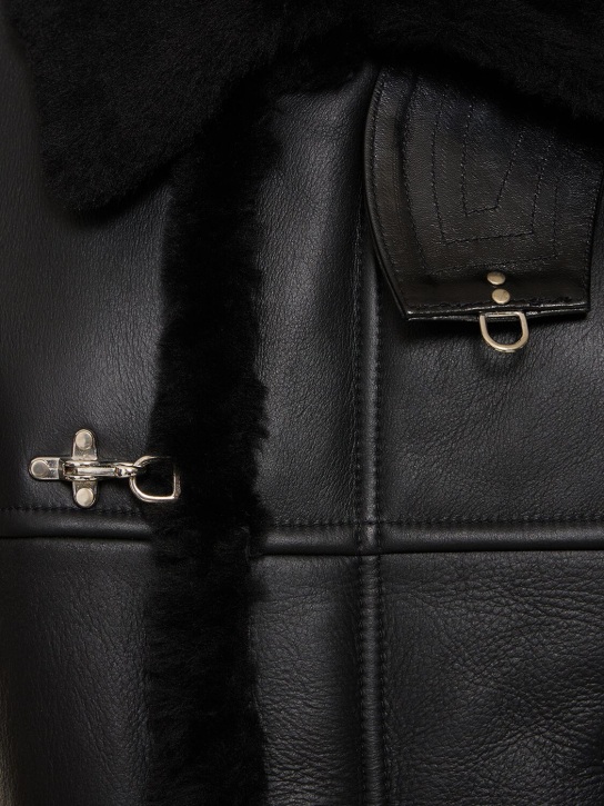 Noir Kei Ninomiya: Shearling fur collar vest w/ hooks & zip