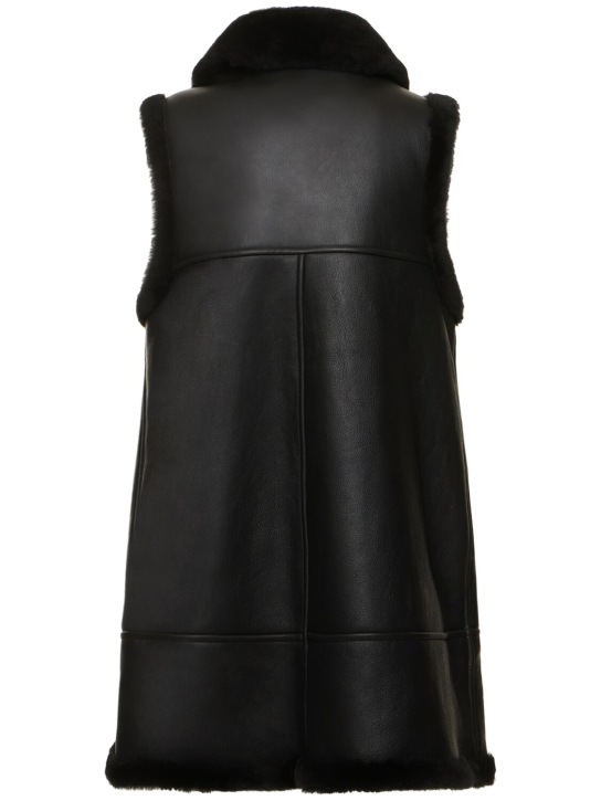 Noir Kei Ninomiya: Shearling fur collar vest w/ hooks & zip