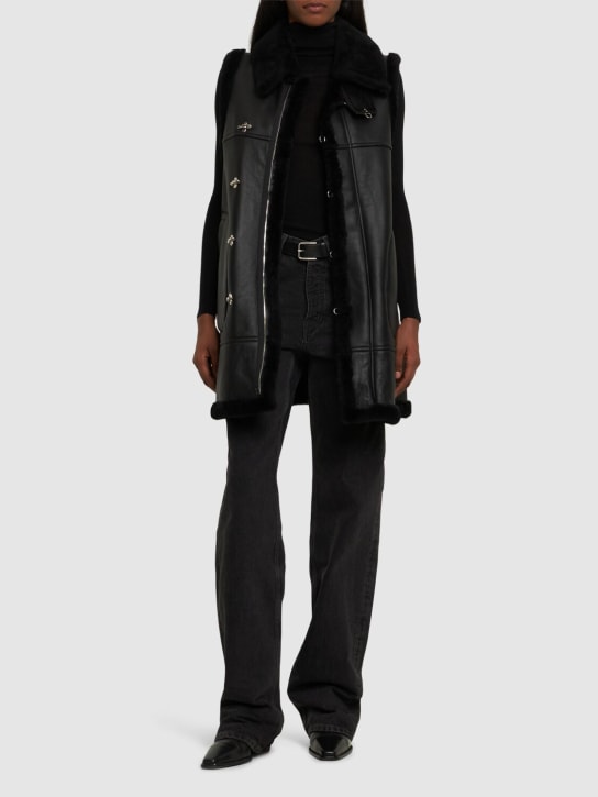 Noir Kei Ninomiya: Shearling fur collar vest w/ hooks & zip
