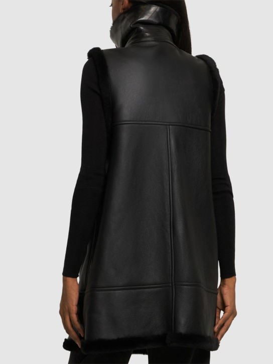 Noir Kei Ninomiya: Shearling fur collar vest w/ hooks & zip