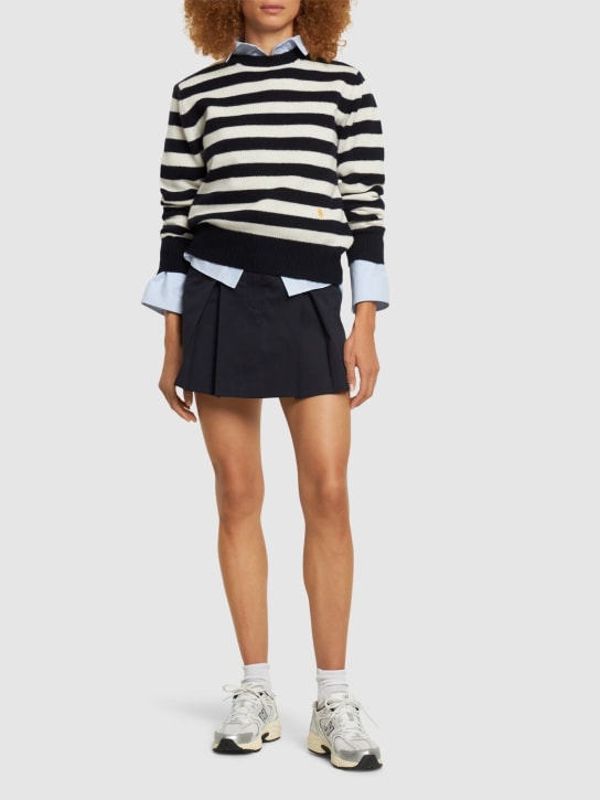 Sporty & Rich: Jupe à double plis Serif