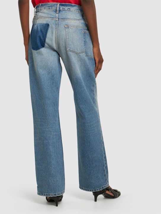 Gauchere: Low waist wide denim jeans w/ cutout