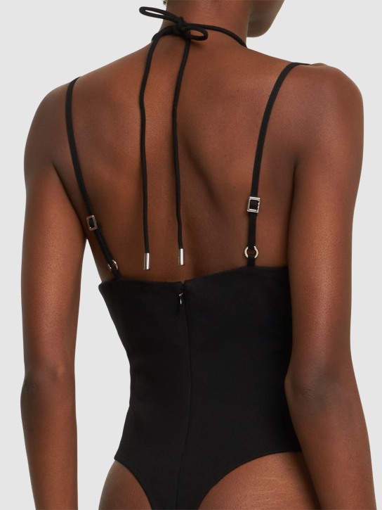 Area: Embellished star cutout bodysuit