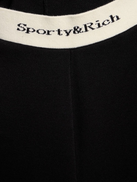 Sporty & Rich: Legging côtelé à logo taille haute