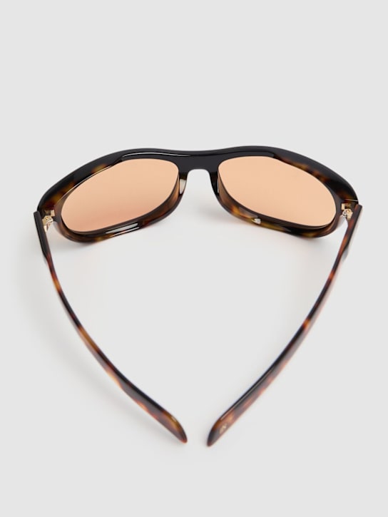 DB Eyewear by David Beckham: Runde Sonnenbrille aus Acetat „DB“