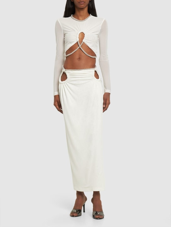 Dion Lee: Jupe midi en jersey transparent embelli