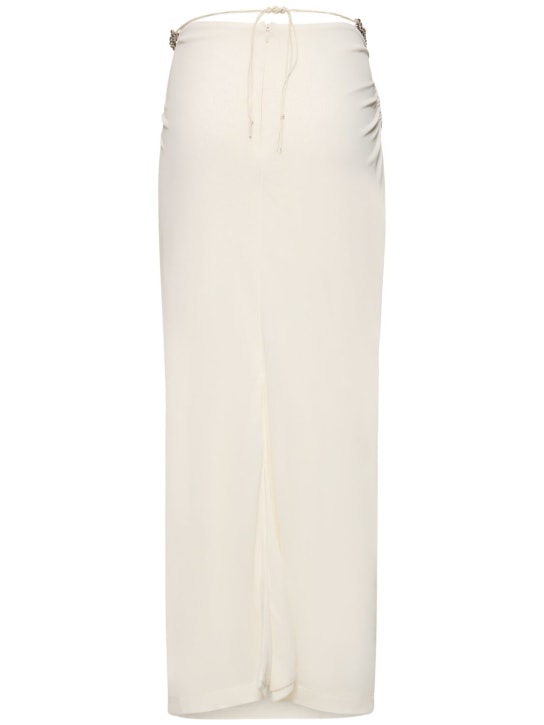 Dion Lee: Jupe midi en jersey transparent embelli