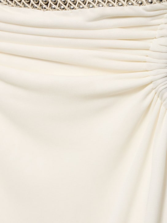 Dion Lee: Jupe midi en jersey transparent embelli