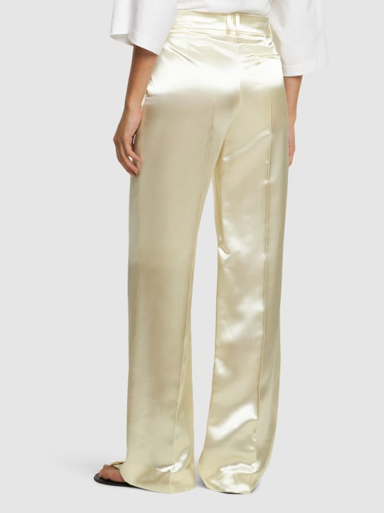 The Row: Pantalon évasé en satin taille mi-haute Encore