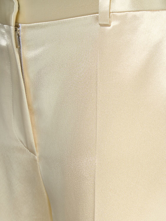 The Row: Pantalon évasé en satin taille mi-haute Encore